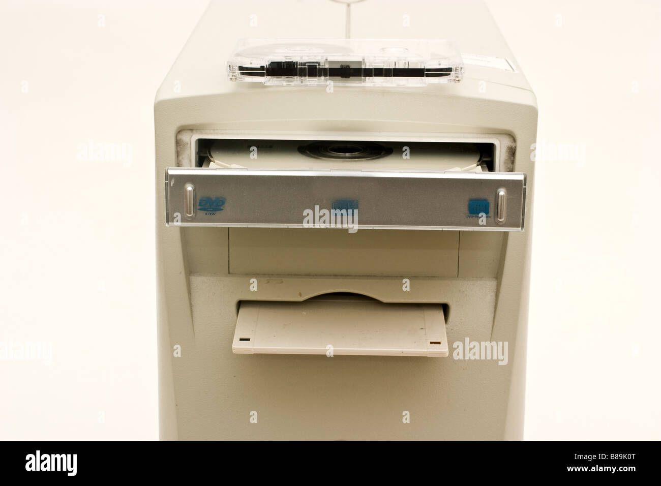 Old tan computer with diskette, cd and tape in drives Stock Photo