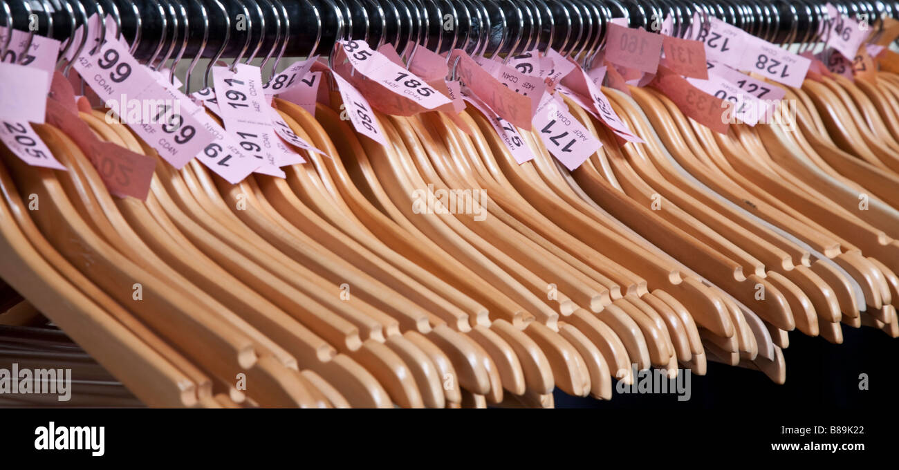 Cloakroom hangers with tickets. Gorton Monastery, Gorton, Greater Manchester, United Kingdom. Stock Photo