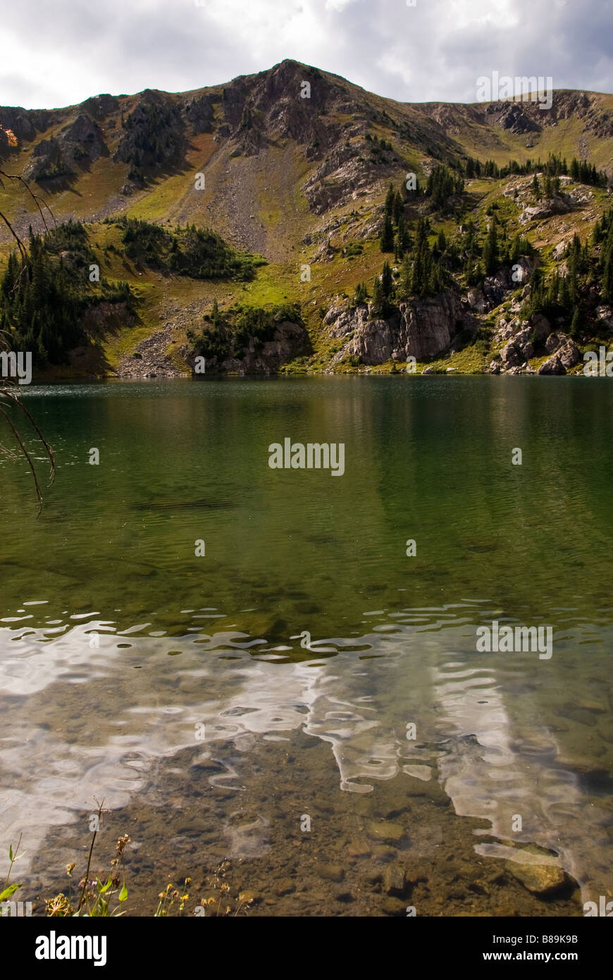 reflective water of bowen lake in never summer wilderness colorado