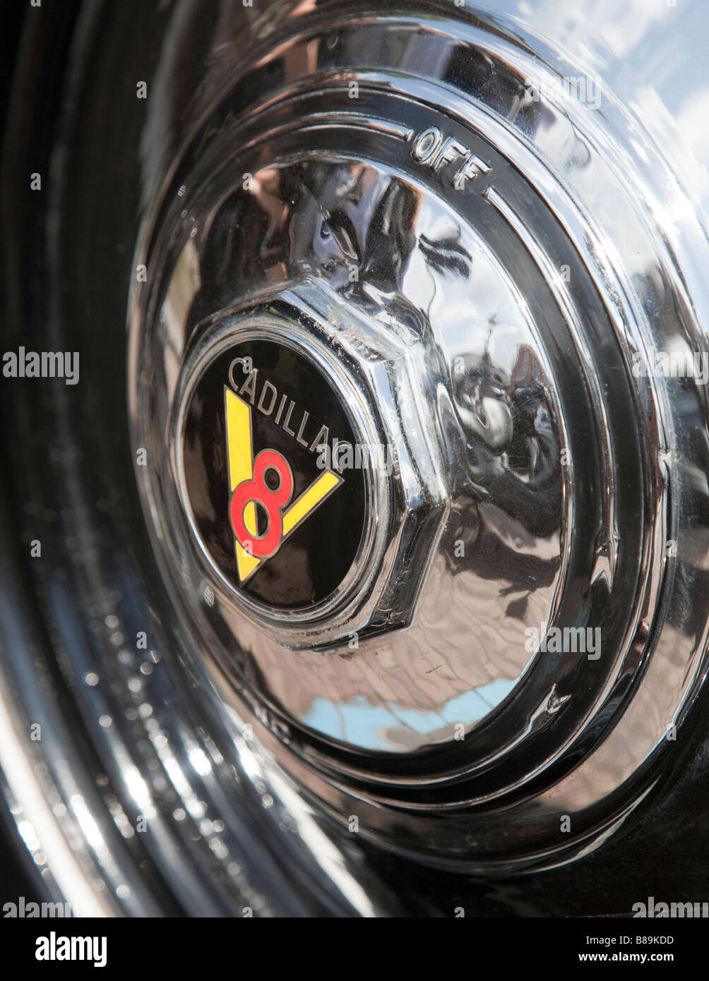 Cadillac V8 classic car badge on wheel hug Stock Photo