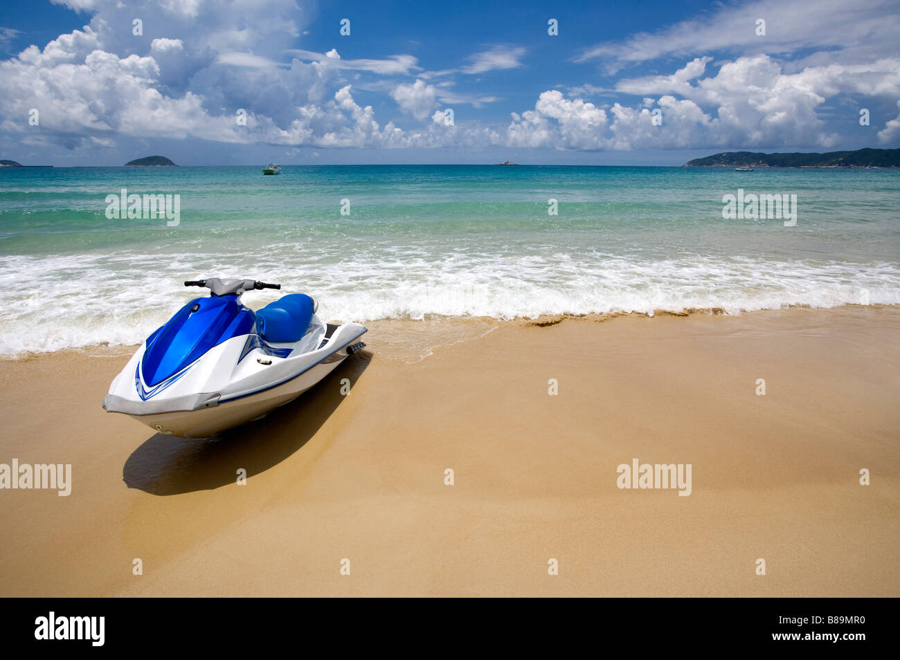 Motorboat berthing on beach Stock Photo