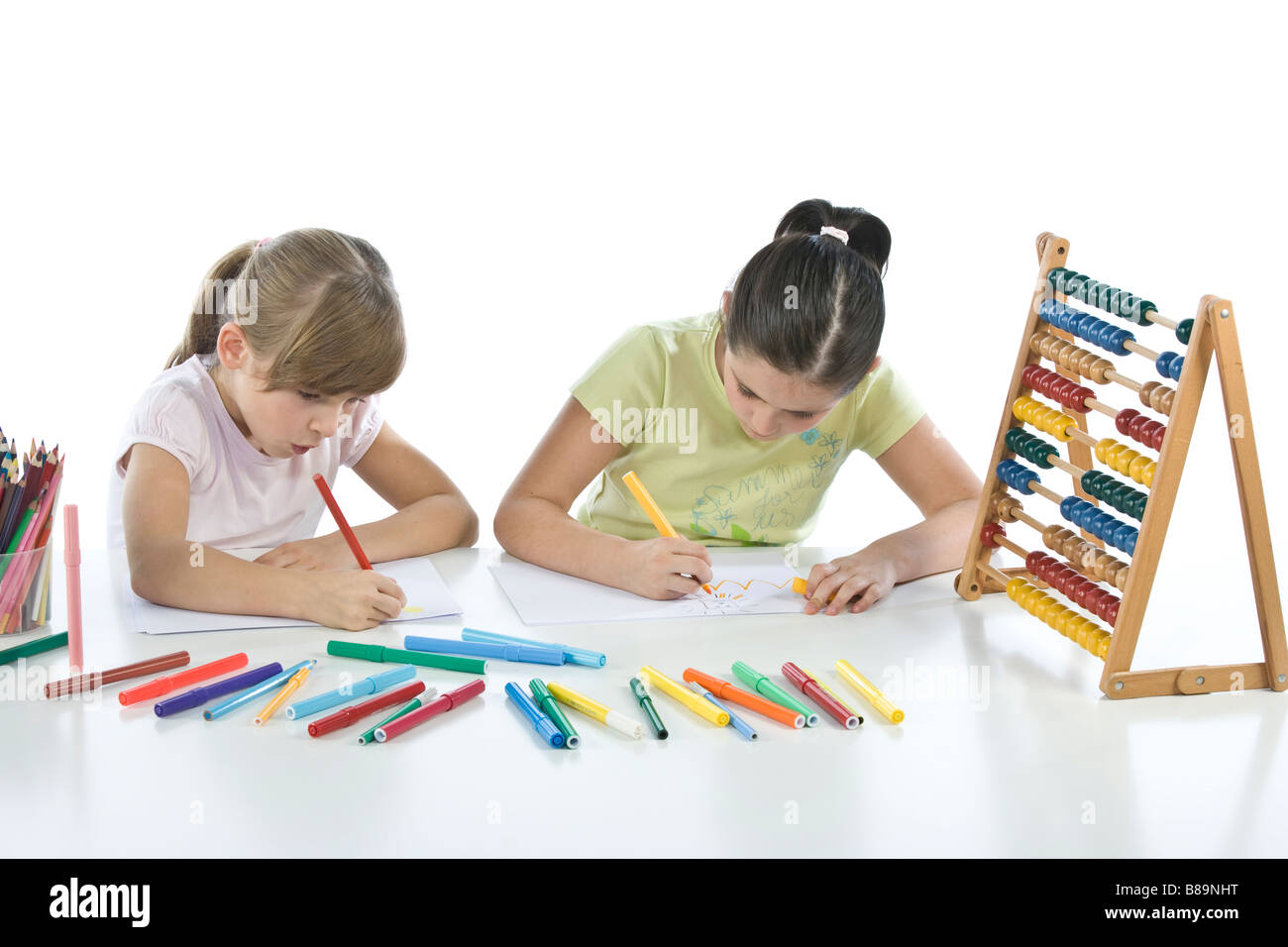 Portrait of smiling schoolchildren draws a picture Stock Photo - Alamy