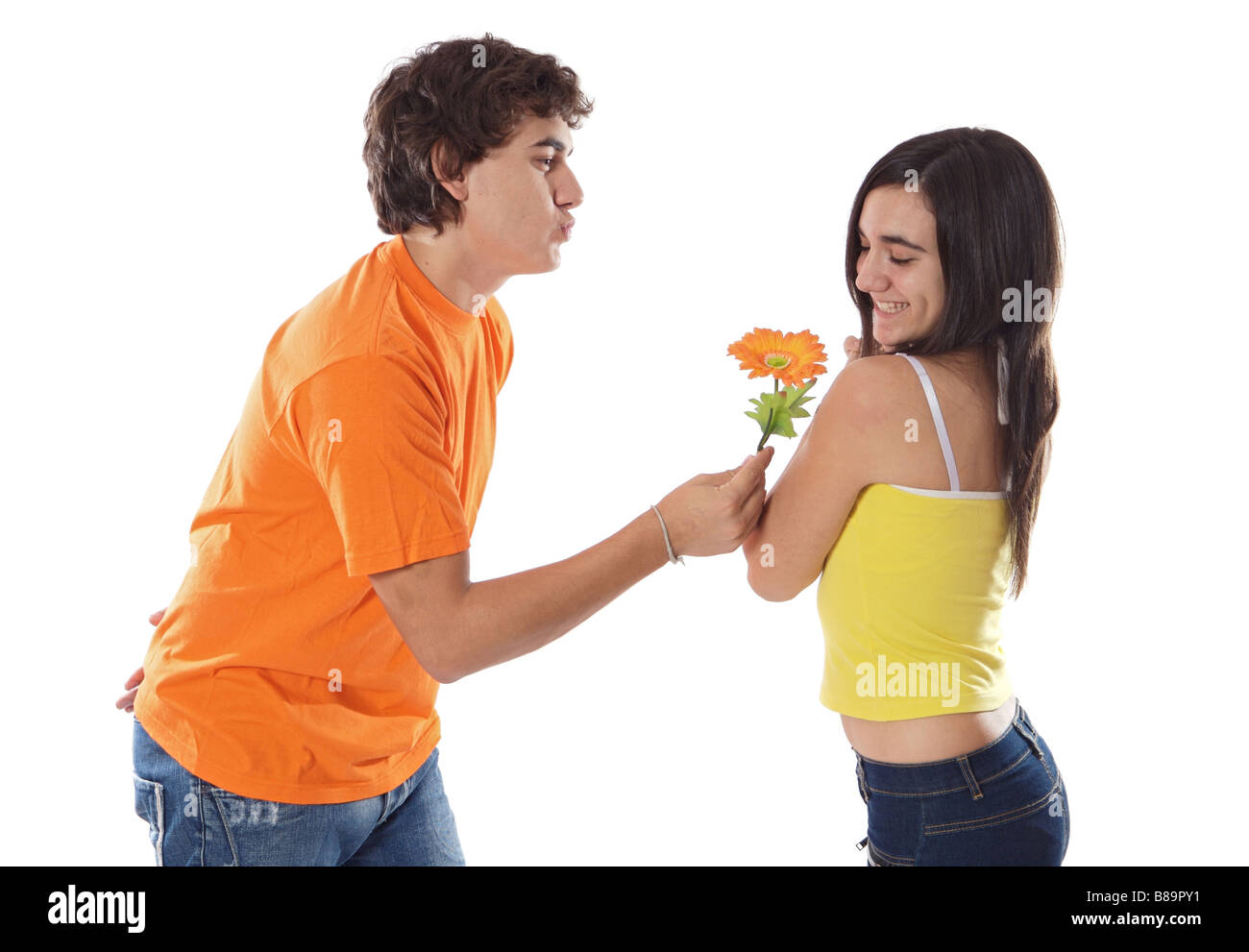 Teen couple in love isolated on white Stock Photo