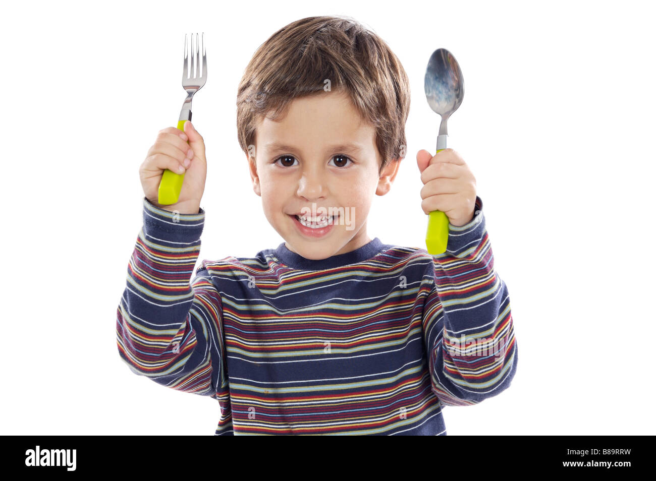 Child with a spoon and fork a over white background Stock Photo - Alamy