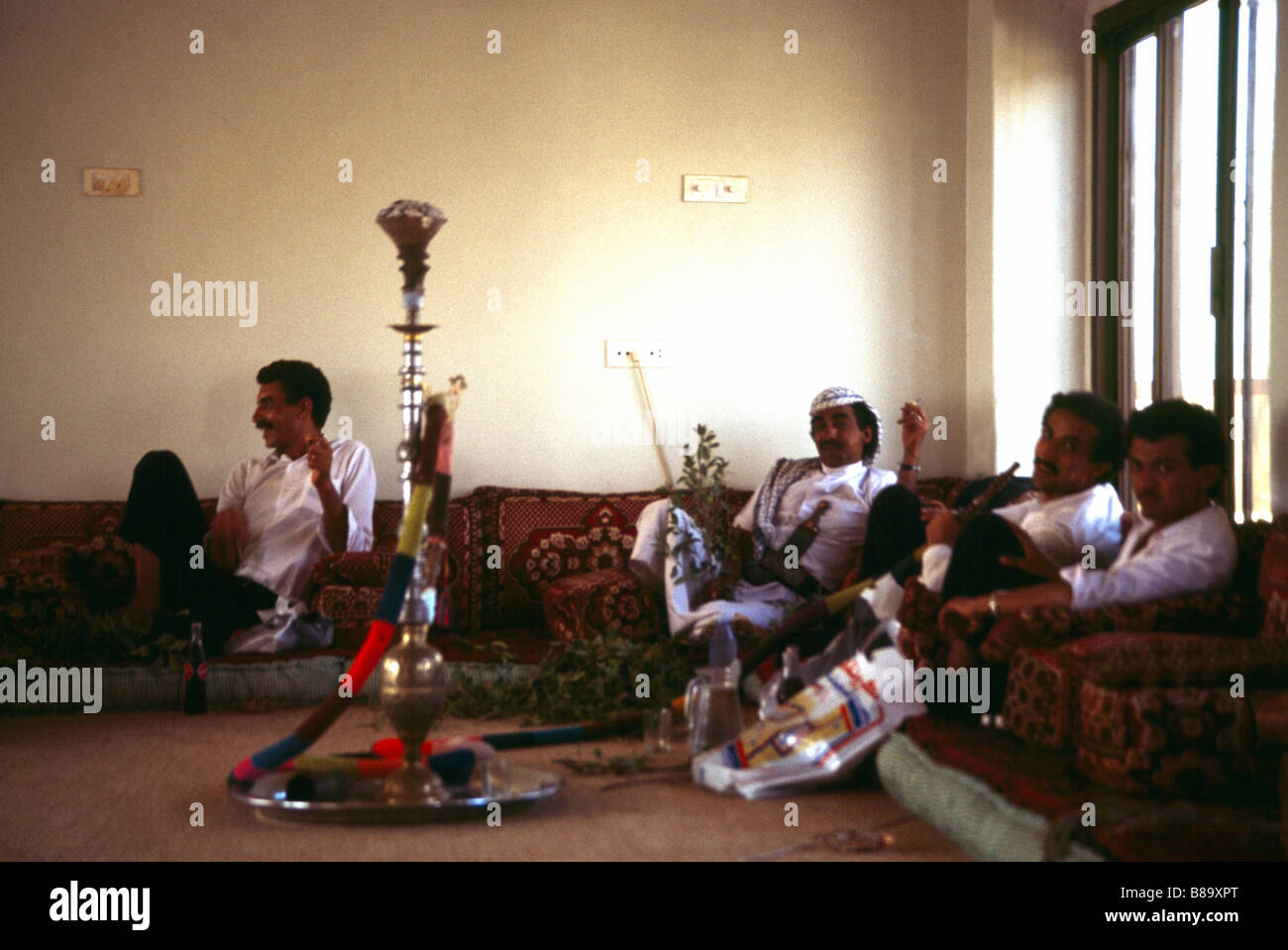 Men Chewing Qat and Chatting Hajja Yemen Stock Photo