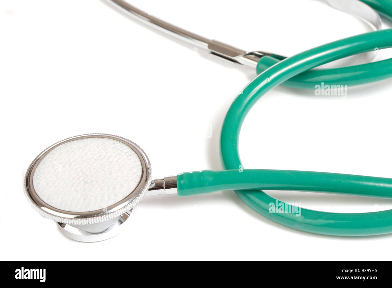 Green stethoscope isolated over white background Stock Photo - Alamy