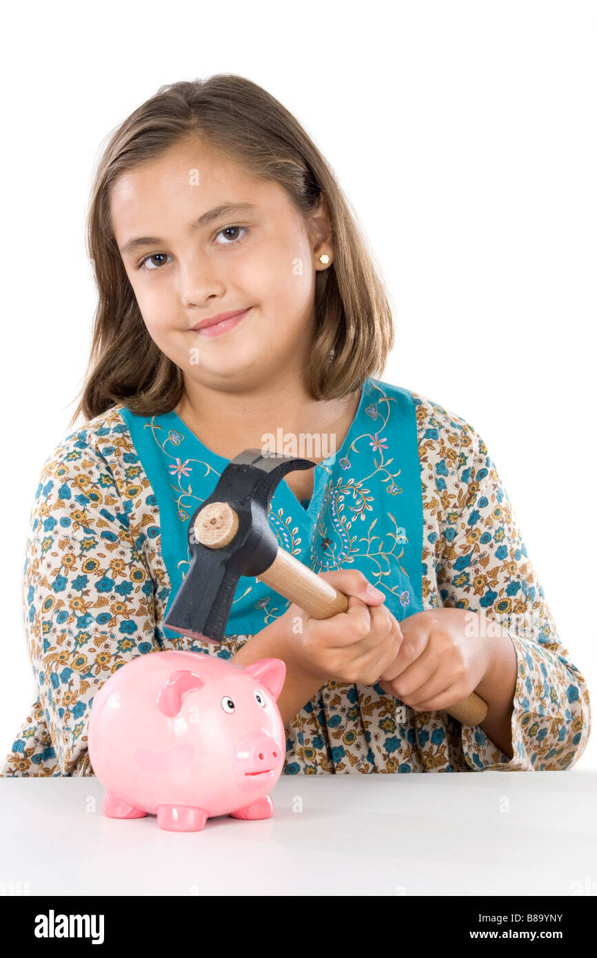 Adorable girl with money box on a over white background Stock Photo Alamy