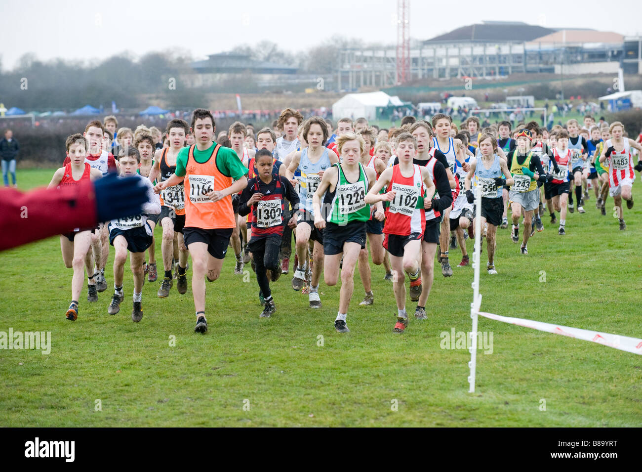 Mass of young athletes at start of cross country race Stock Photo Alamy