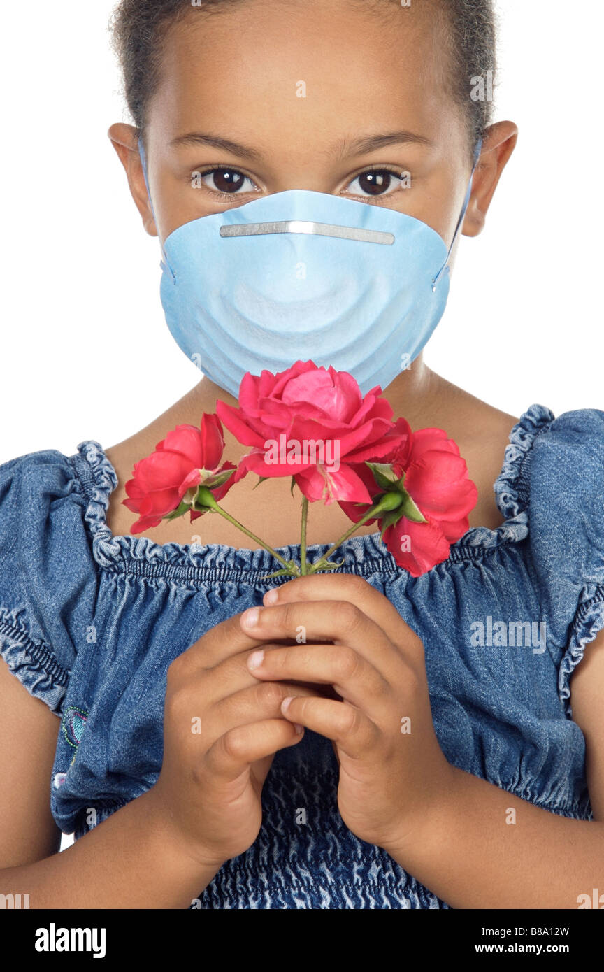 Girl with mask and flower no allergies Stock Photo Alamy