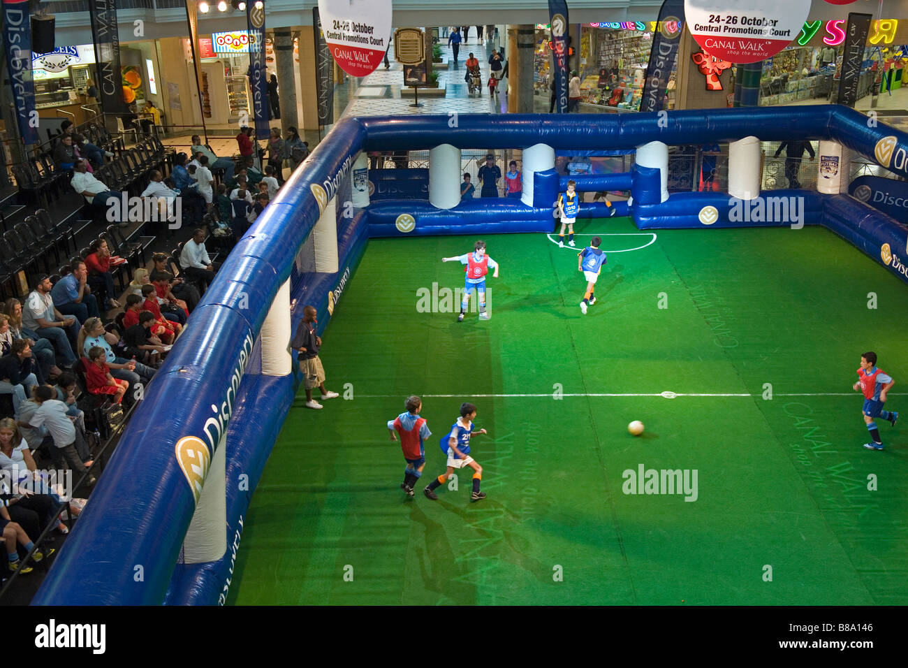 Boys playing in an indoor soccer competition at Canal Walk Mall in Cape