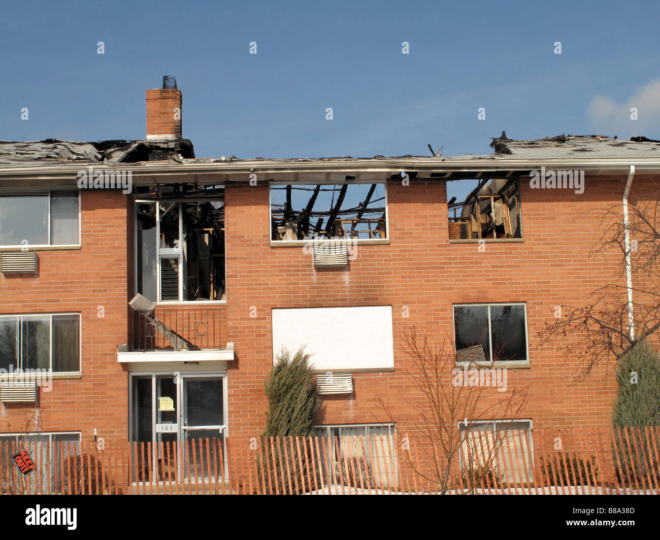 Fire damaged apartment building. Stock Photo
