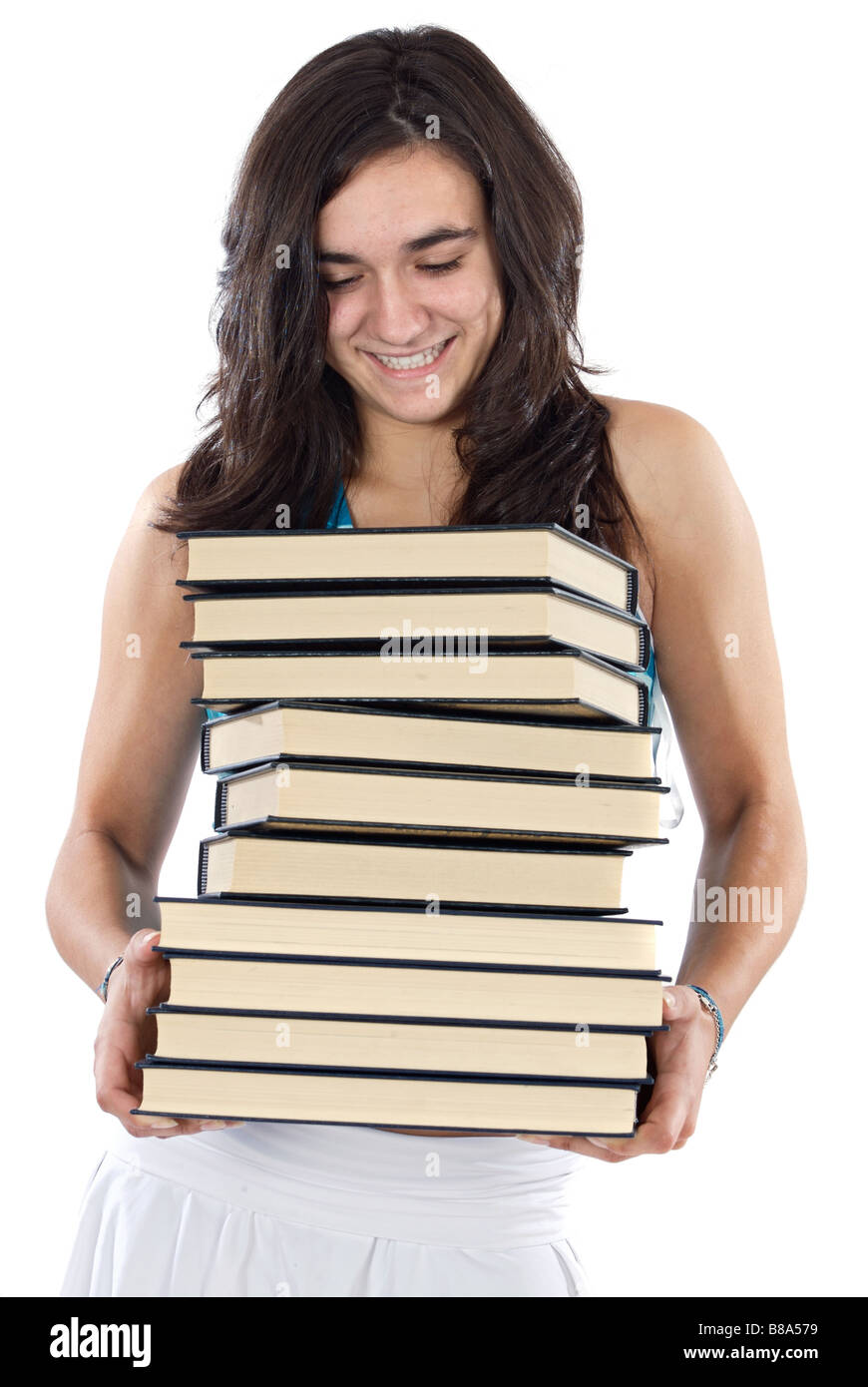 Pretty teenager girl with a heavy pile of books Stock Photo - Alamy
