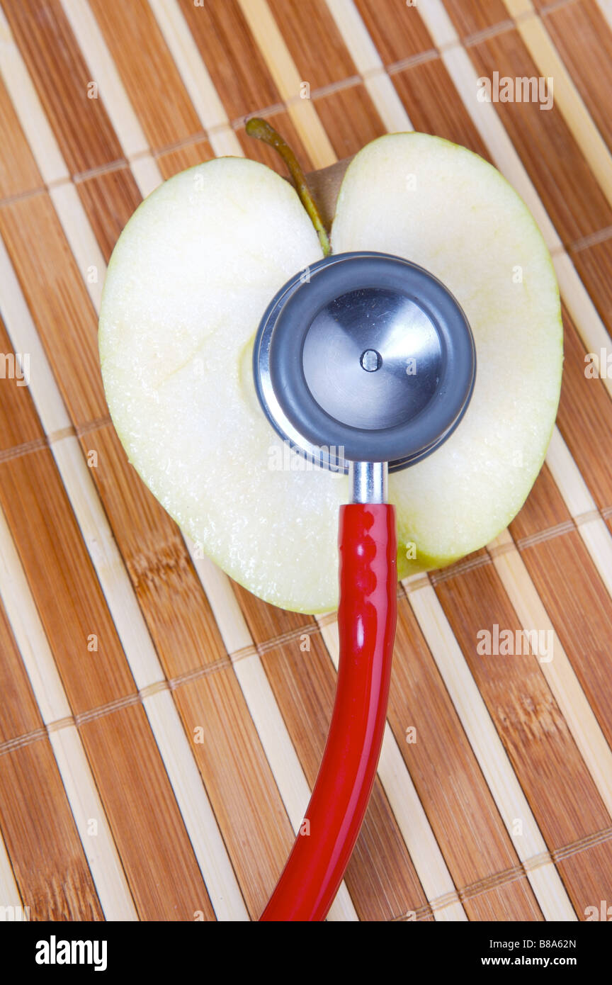 Apple with stethoscope Stock Photo Alamy