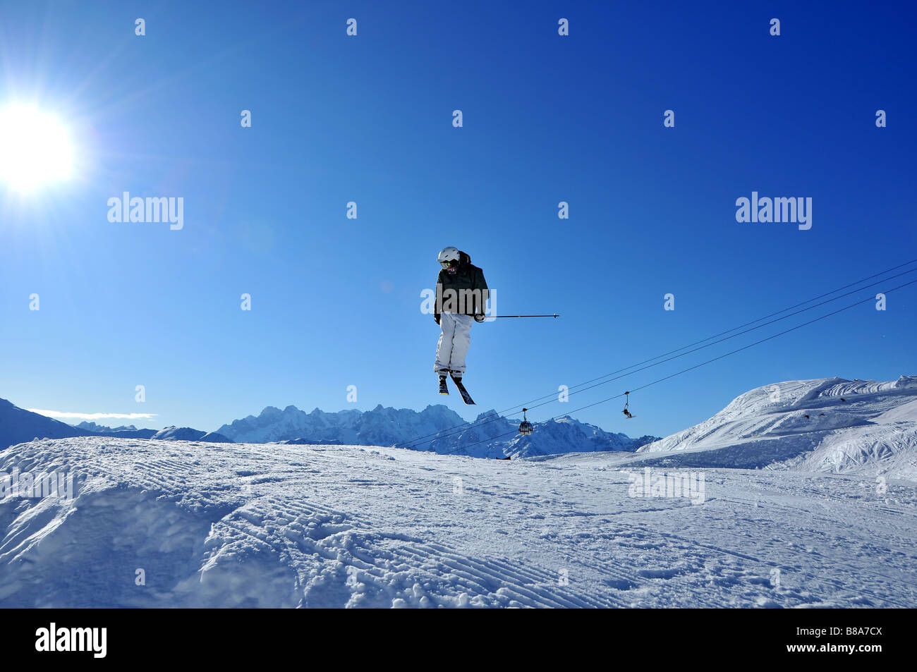skier landing after a jump Stock Photo Alamy