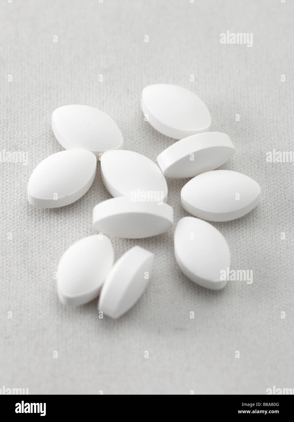 Close up of several white tablets Stock Photo Alamy
