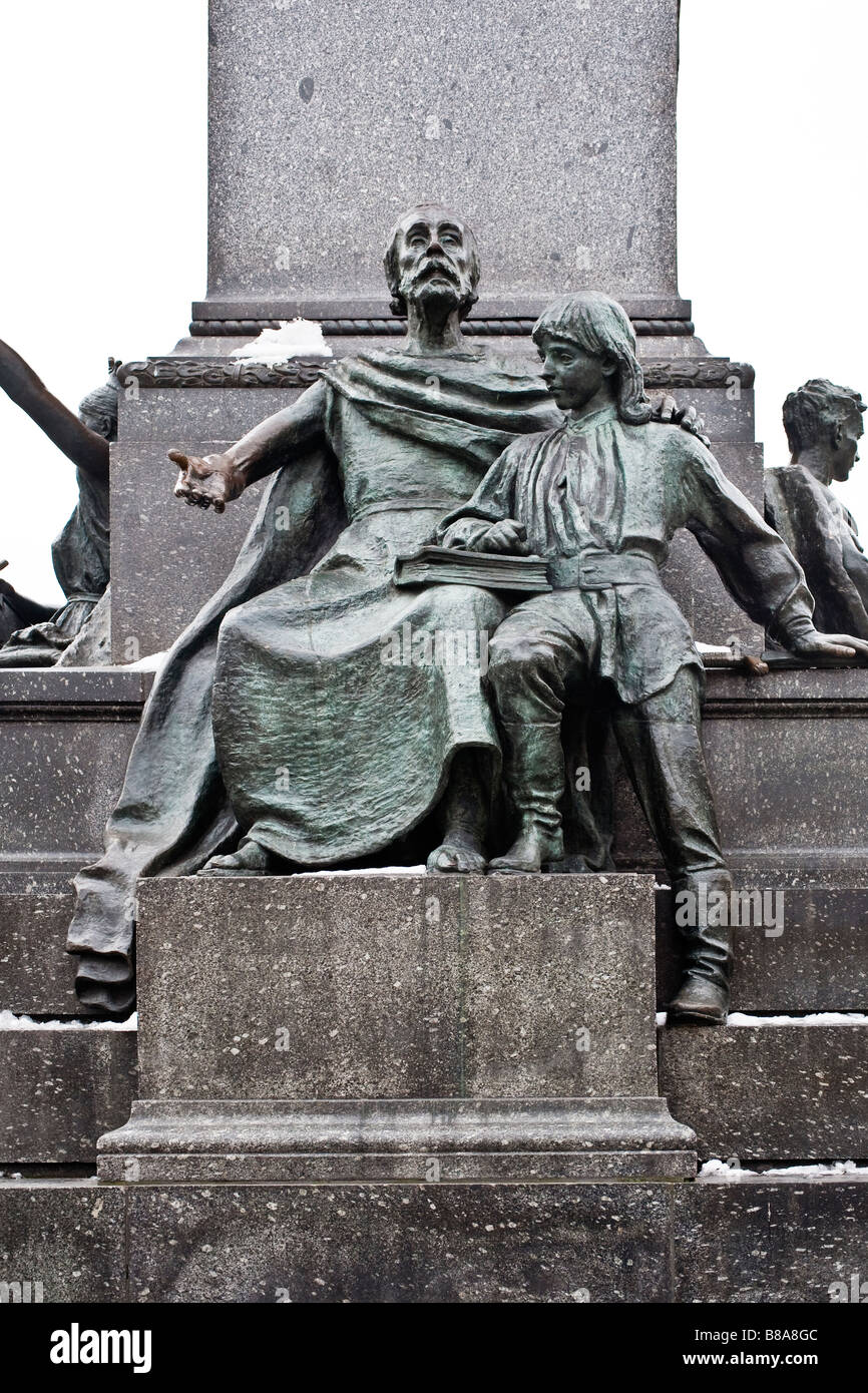 Figure representing science and education on the base of monument to Mickiewicz. Rynek Glowny, Krakow, Poland Stock Photo