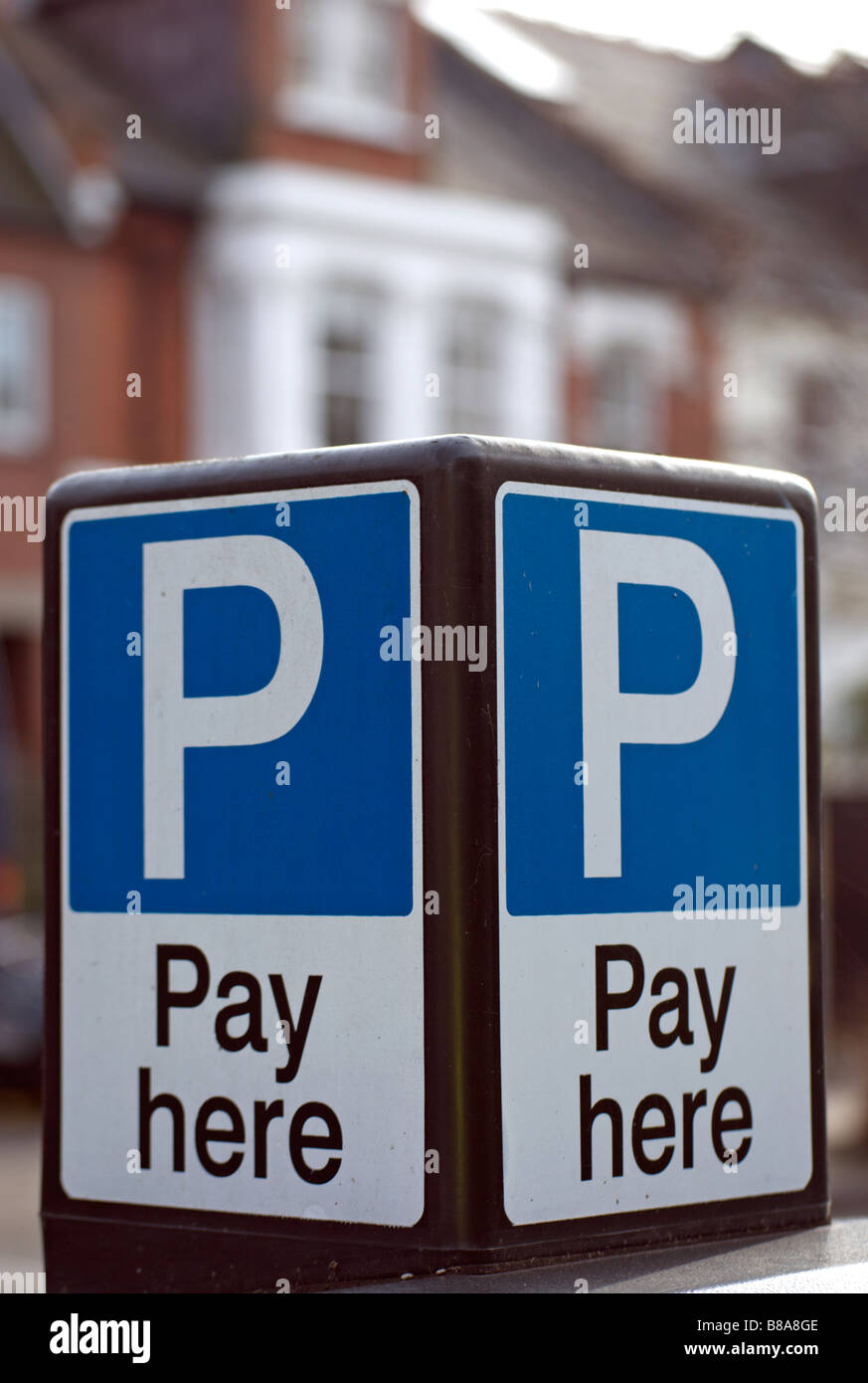 british street sign on a pay and display car parking machine, in chiswick, west london, england Stock Photo