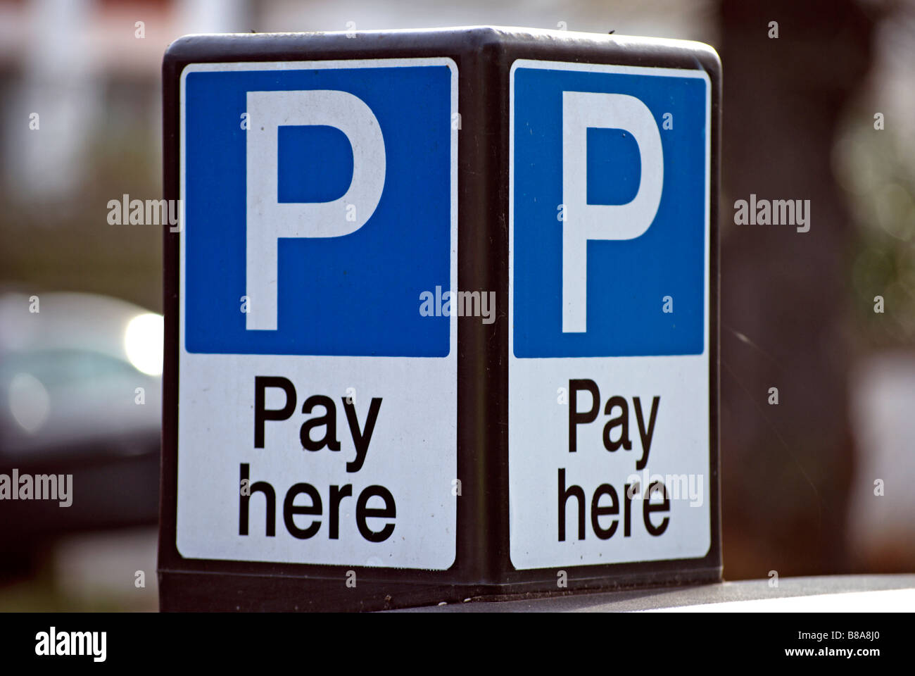british street sign on a pay and display car parking machine, in chiswick, west london, england Stock Photo
