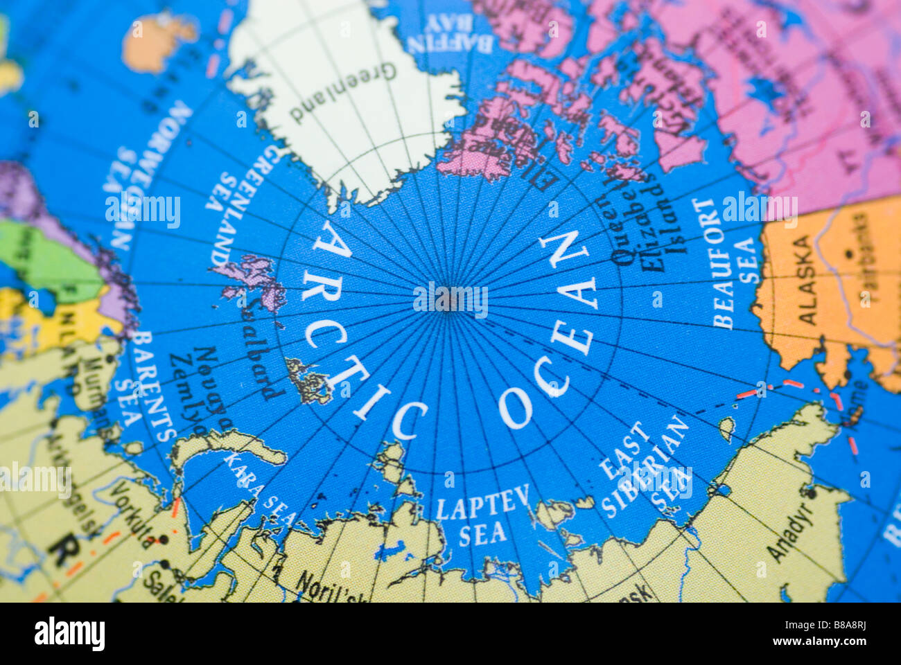 Arctic ocean close up on a globe Stock Photo