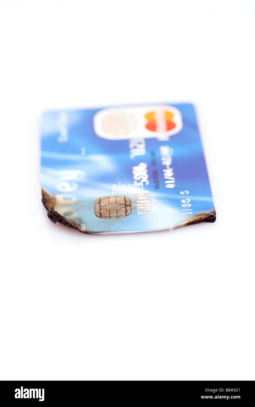 Burned credit card Stock Photo