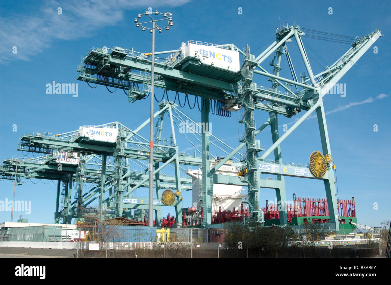 Three container loaders, Port of Los Angeles Stock Photo - Alamy