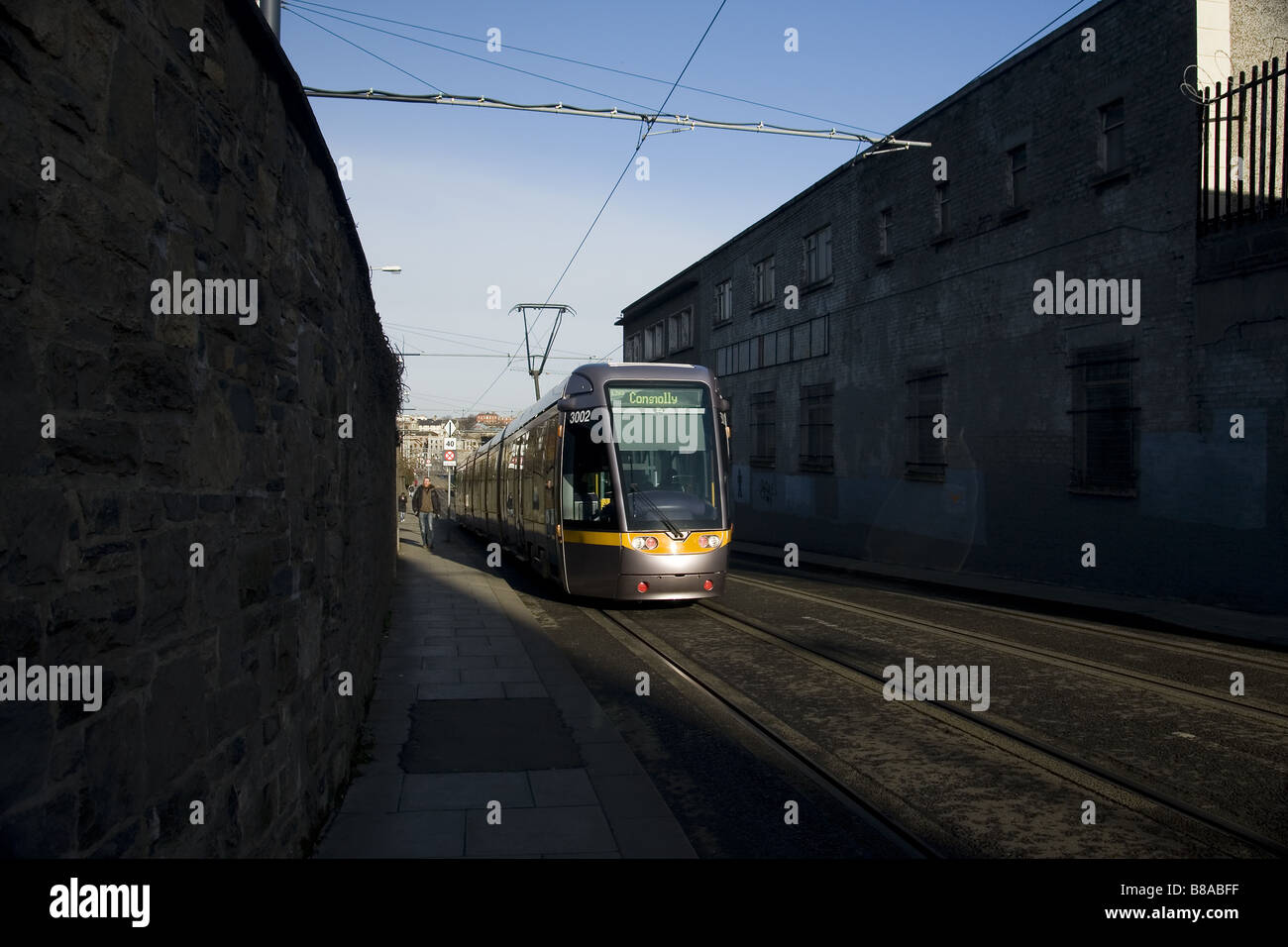 Luas tram going up the hill in Kilmainham district, Dublin Stock Photo