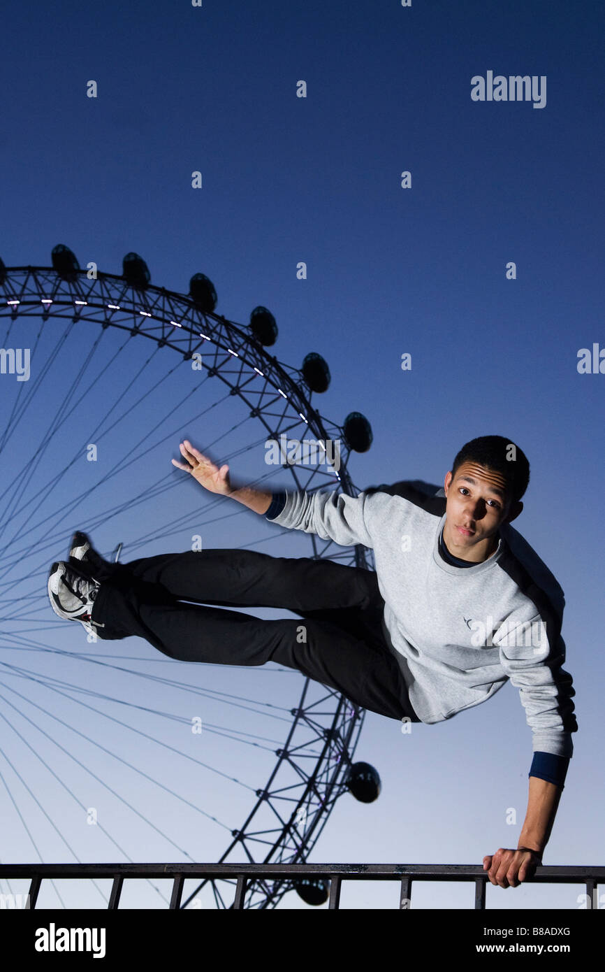 Astonishing shoot of free runner in front of the Big Eye Stock Photo