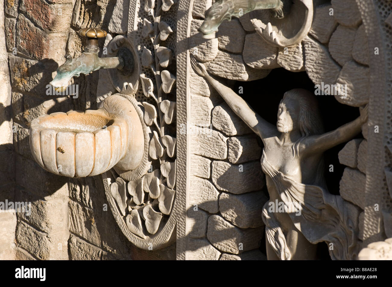 Details of a fountain in the sun in a small greek village on an aegean island Stock Photo