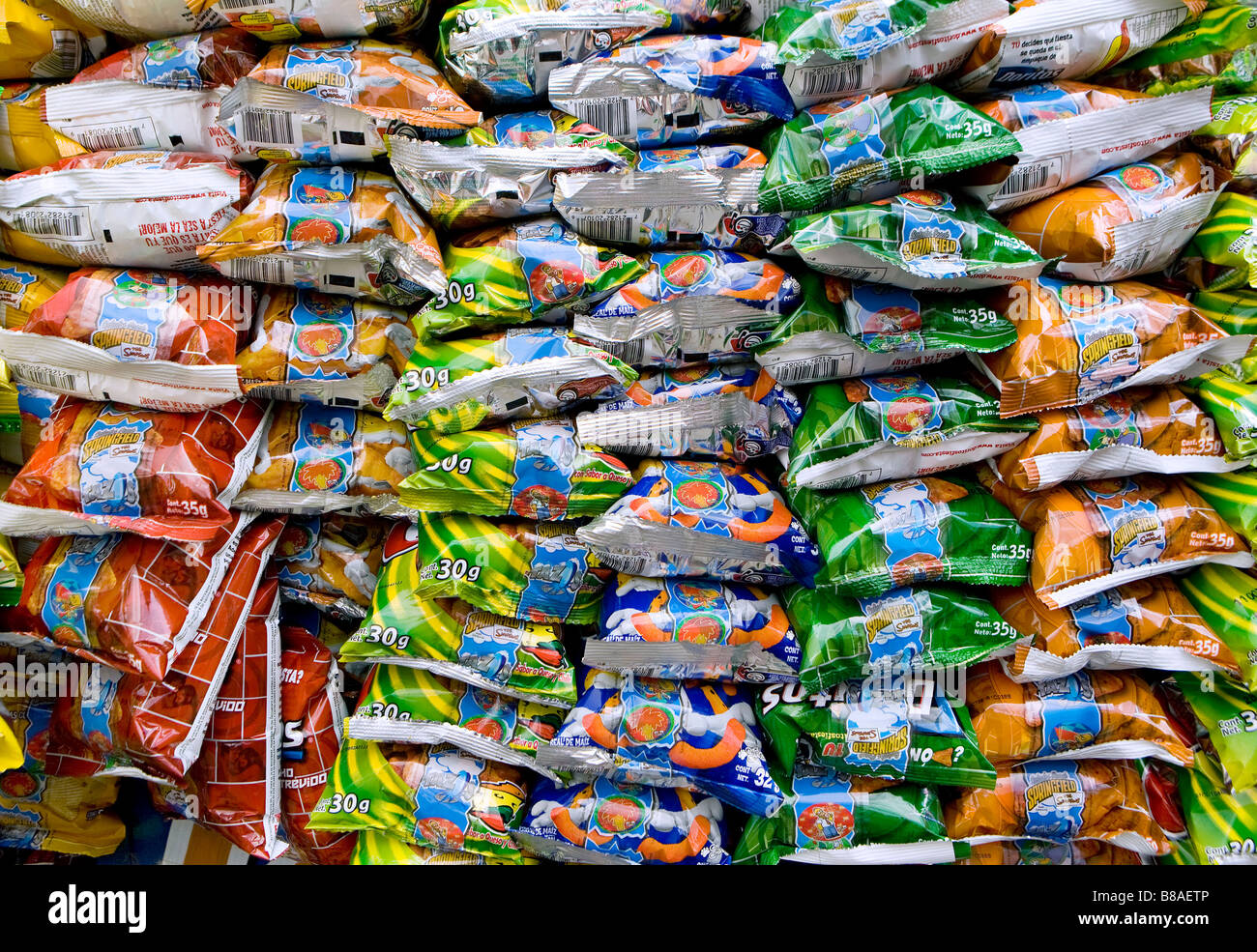 Close up of plastic bags of chips for sale on the street in Quetzaltenango Western Highlands Guatemala Stock Photo