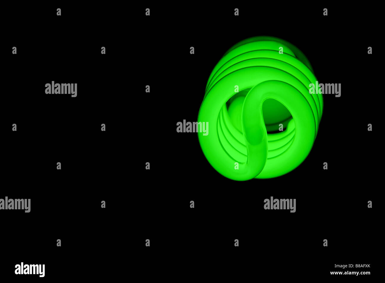 A green fluorescent energy saving light bulb Stock Photo - Alamy