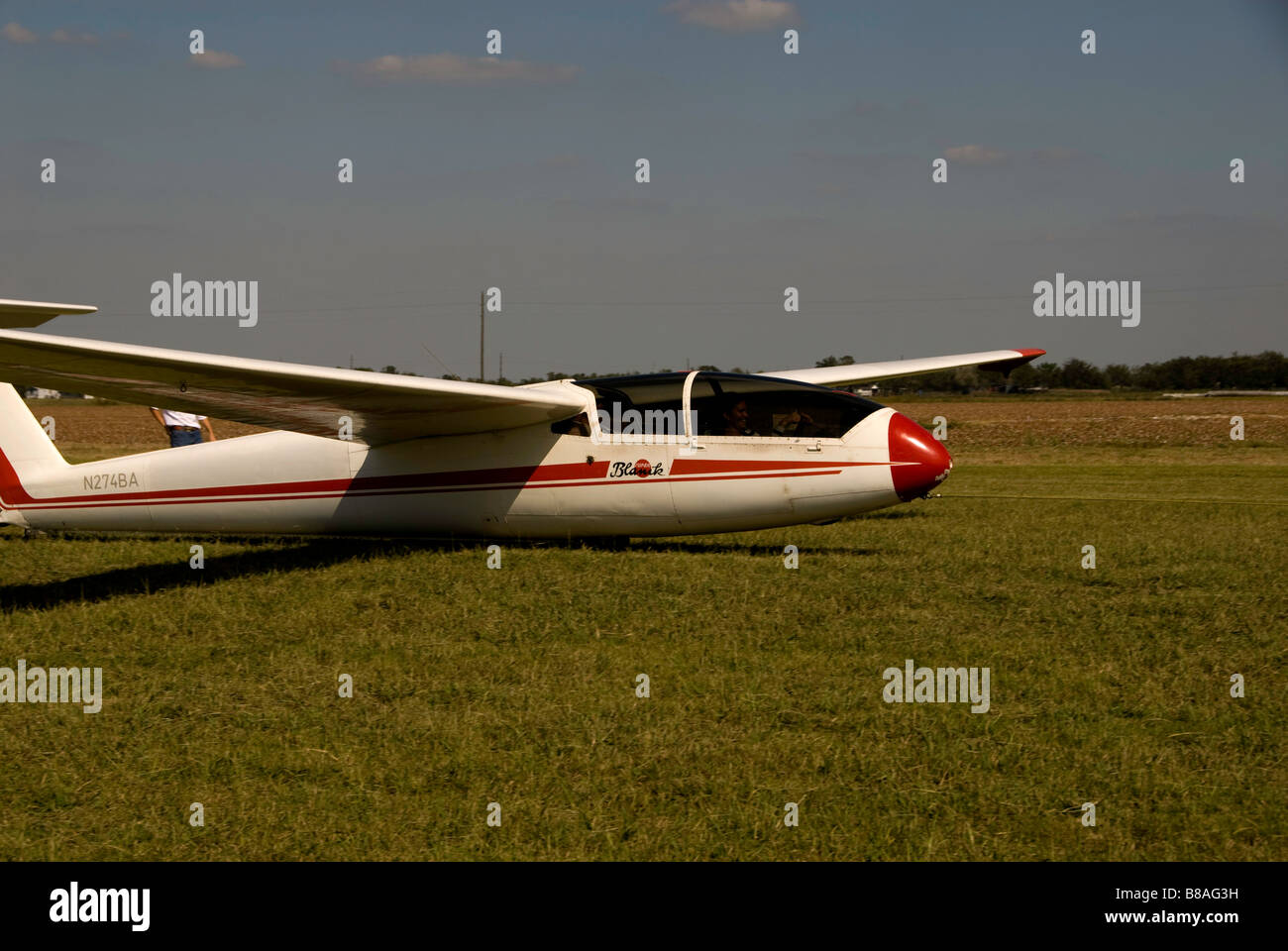 Glider behind tow plane in rural Texas Stock Photo Alamy