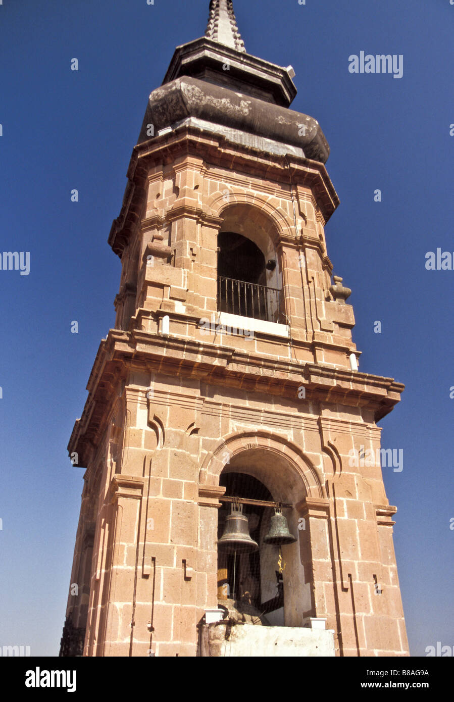 The bell tower on top of  the Templo de Santa Rosa de Viterbo.  Built in 1752, the temple is in Queretaro, Mexico Stock Photo