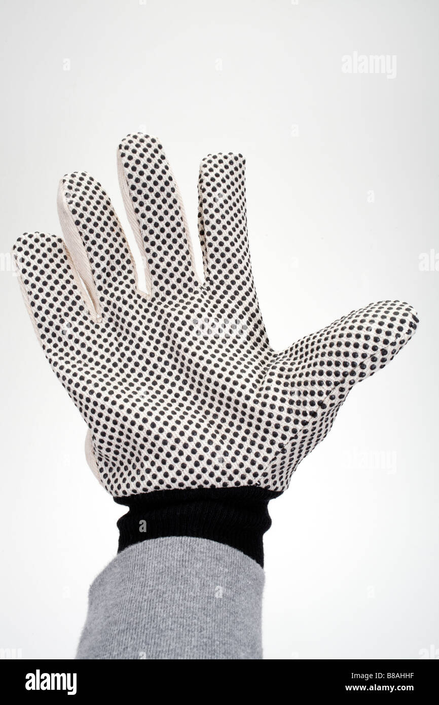 Hand in glove thumbs up hi-res stock photography and images - Alamy