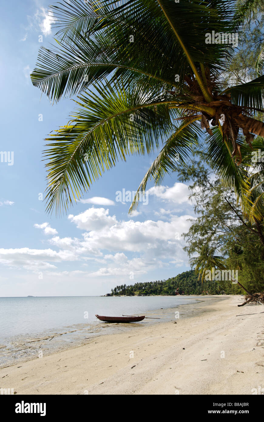 Deserted tropical beach with fishing boat Ao Nai Wok beach on Koh Pangan  island Thailand Stock Photo - Alamy