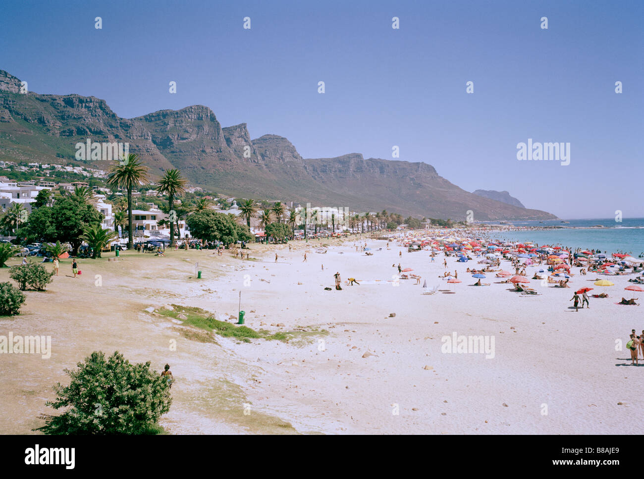 Camps Bay beach and sea in Cape Town in South Africa in Sub Saharan Africa. Apartheid Capetown African Holiday Vacation Tourism Tourist Travel Stock Photo