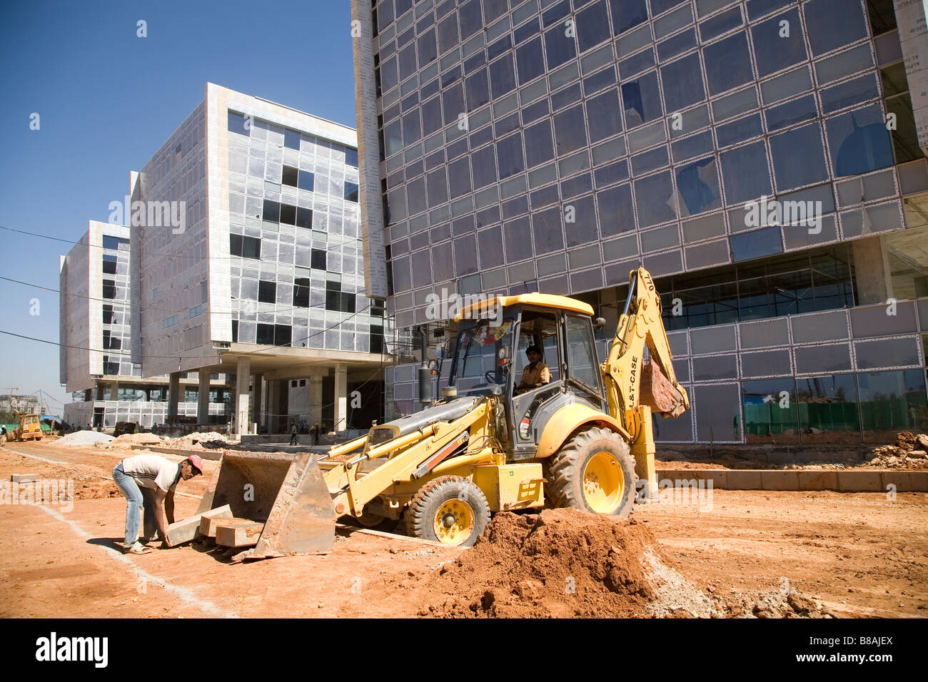 A hydraulic digger on a construction site in Bangalore, India. Stock Photo