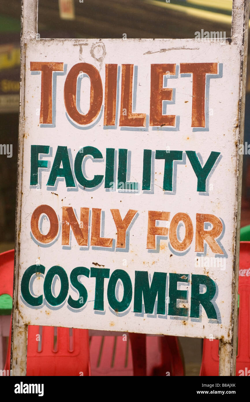 A misspelt sign on the Rohtang Pass in northern India. The sign attempts to say the the toilet is only for customers. Stock Photo