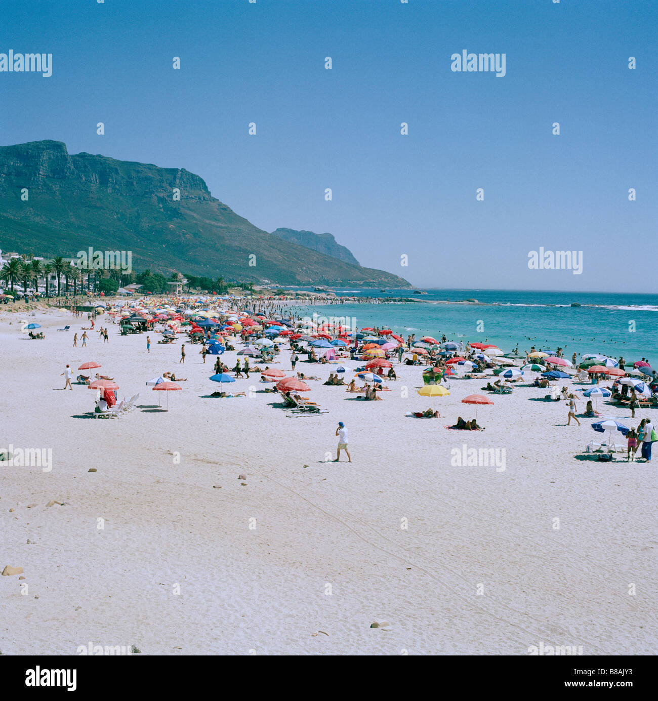 Camps Bay beach and sea in Cape Town in South Africa Sub Saharan Africa. Apartheid Capetown African Holiday Vacation Tourism Tourist Travel Seascape Stock Photo