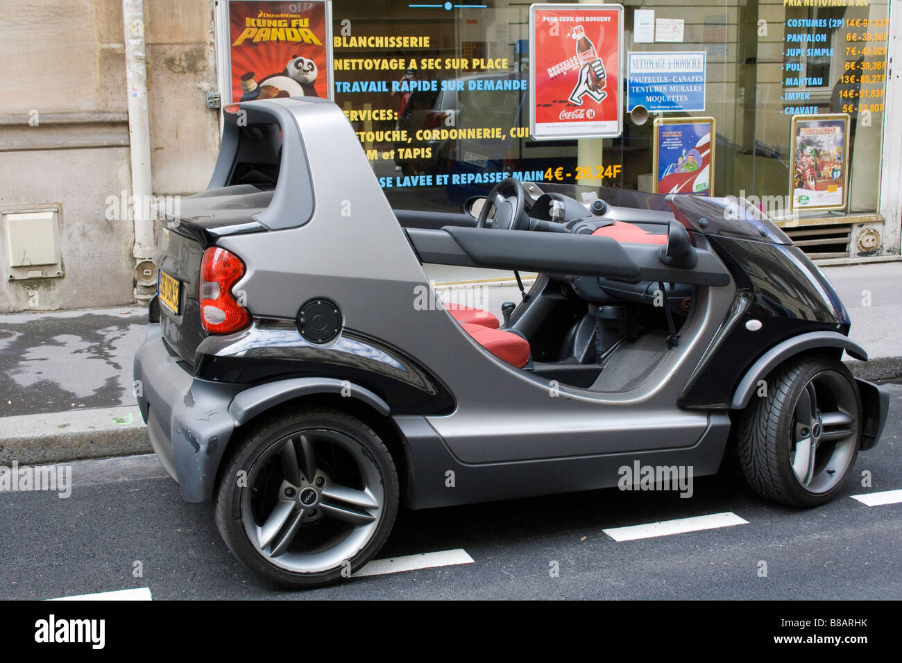 Convertible Smart car in the City of Paris Stock Photo - Alamy