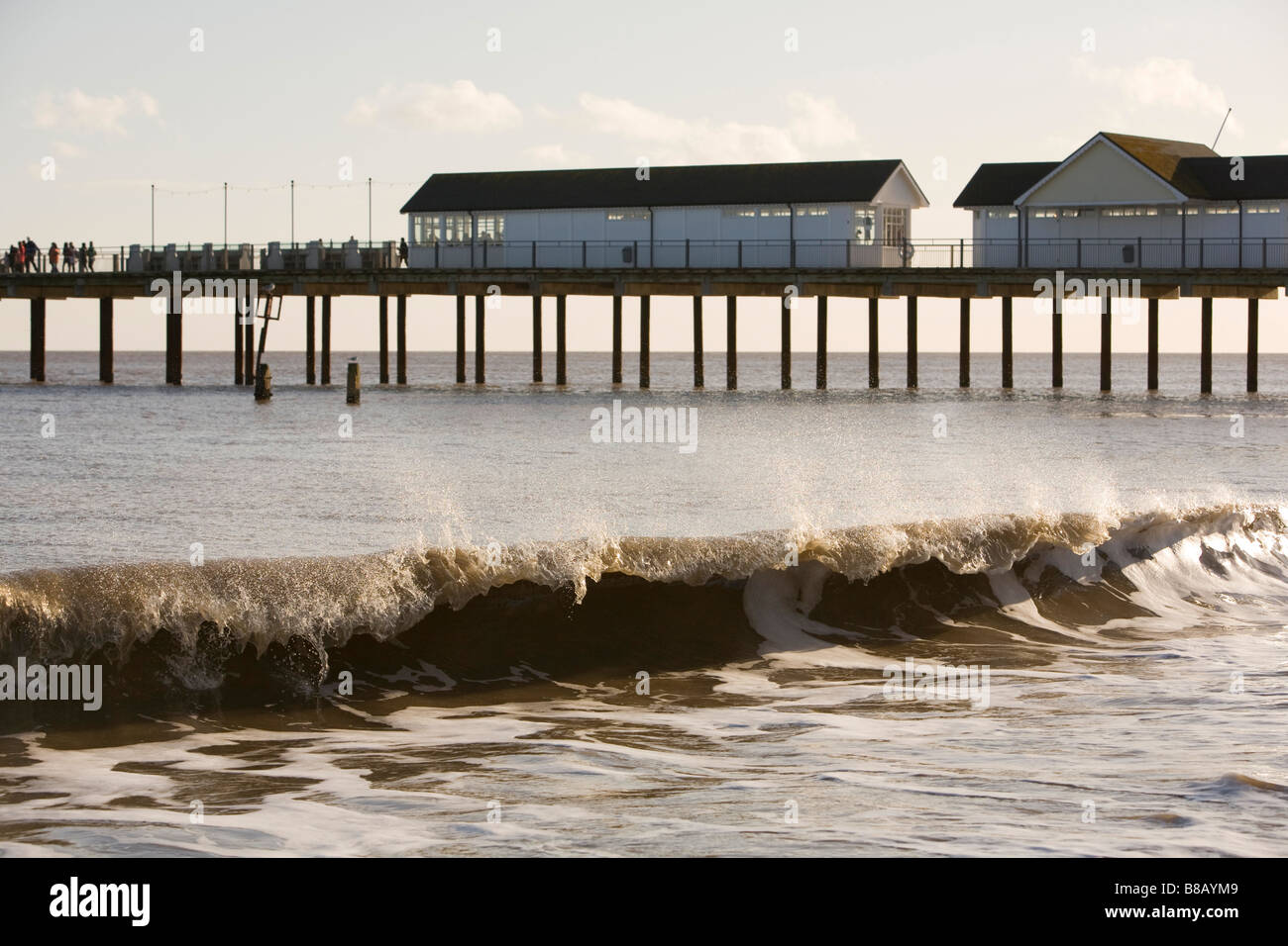 Windswept Waves Crash Break On To Beach Near Southwold Pier On Winter windswept-waves-crash-break-on-to-beach-near-southwold-pier-on-winter