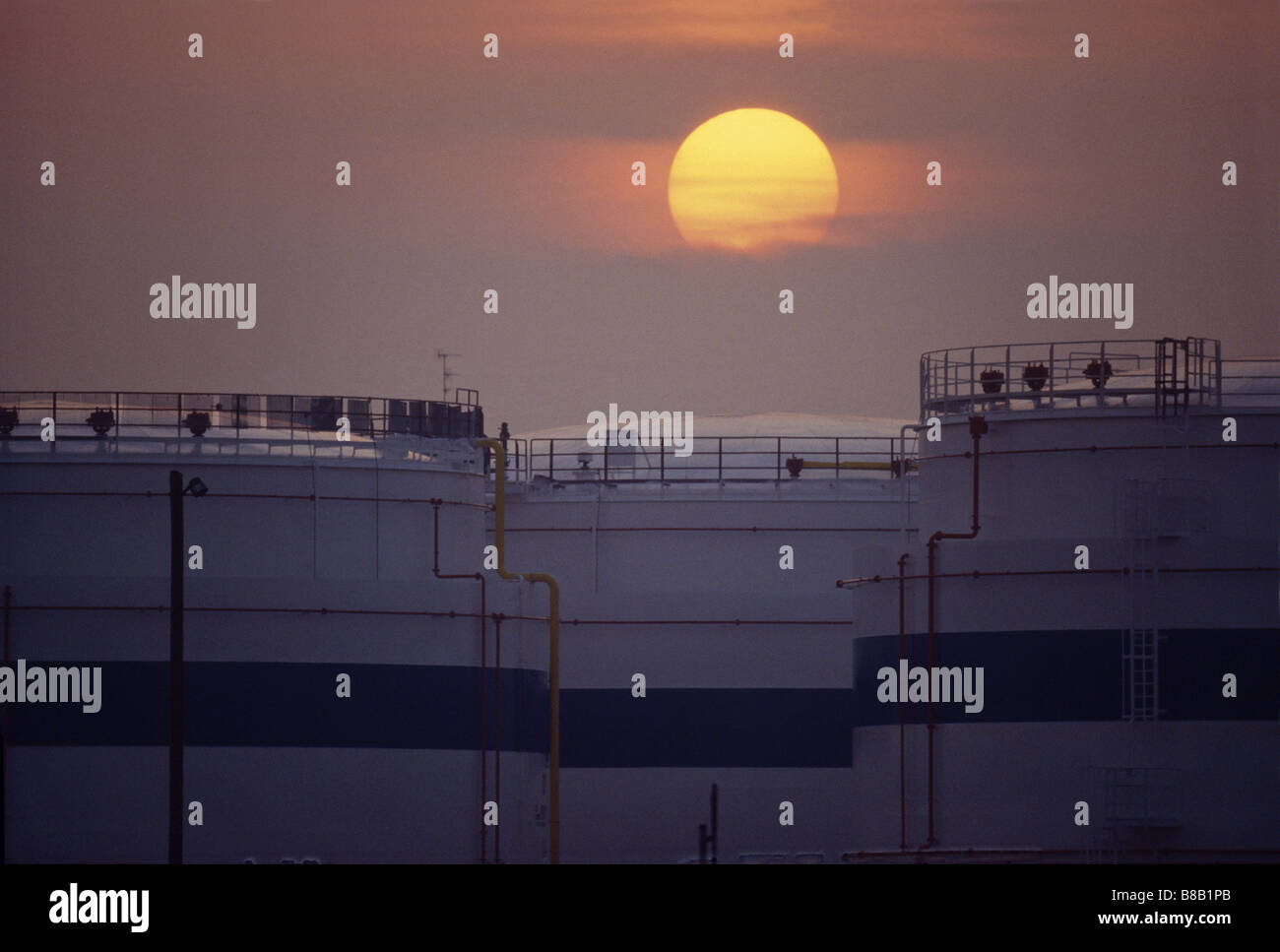 Sunset over MUT Oil-Tanks in Magdeburg. Stock Photo