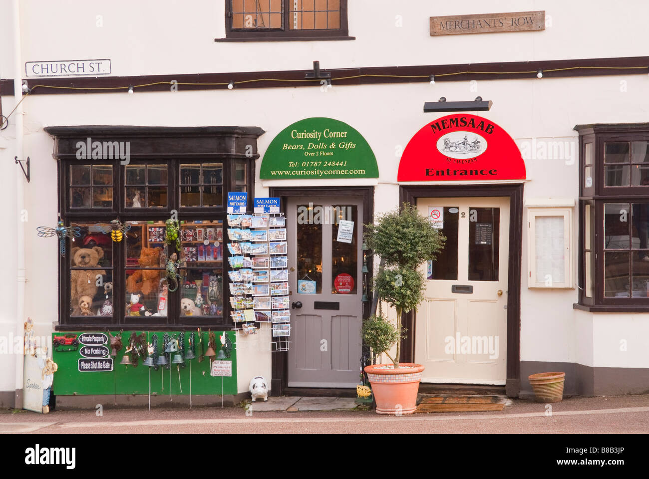 Curiosity corner shop store selling gifts,dolls and teddy bears,next to Memsaab the indian restaurant in Lavenham,Suffolk,Uk Stock Photo