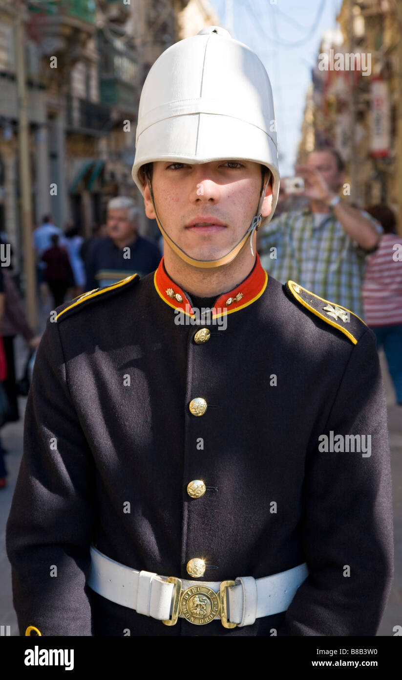 Malteese volunteer dressed in British colonial uniform to promote the Saluting Battery. Valletta, Malta. Stock Photo