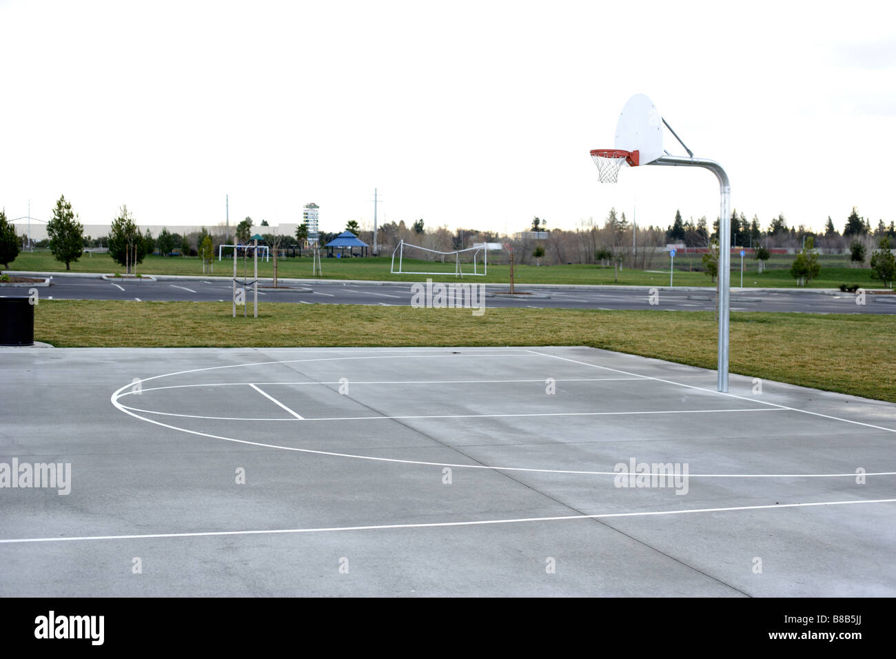 Basketball court lines on a street court Stock Photo Alamy