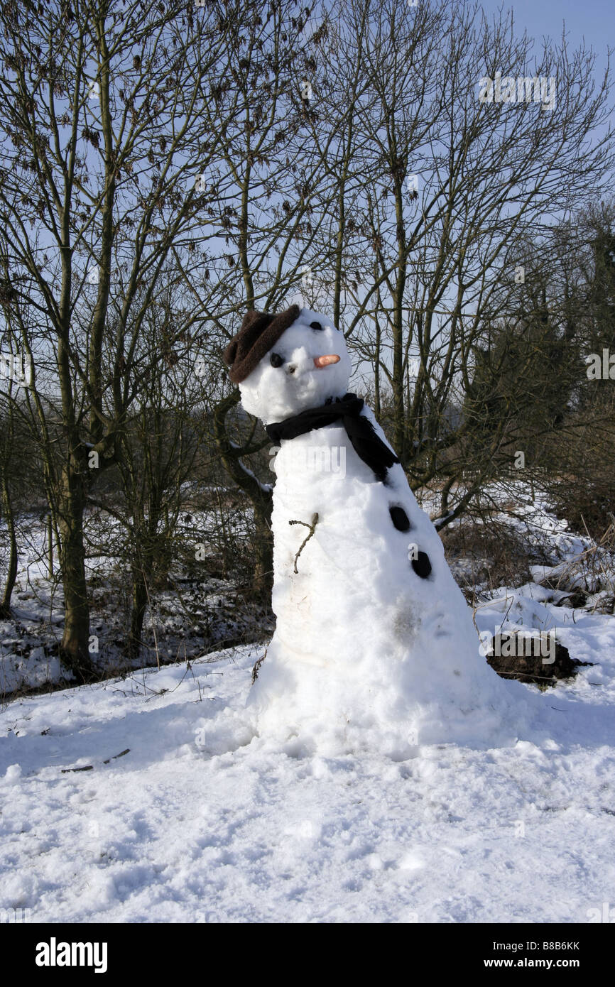 Snowman on a towpath Stock Photo