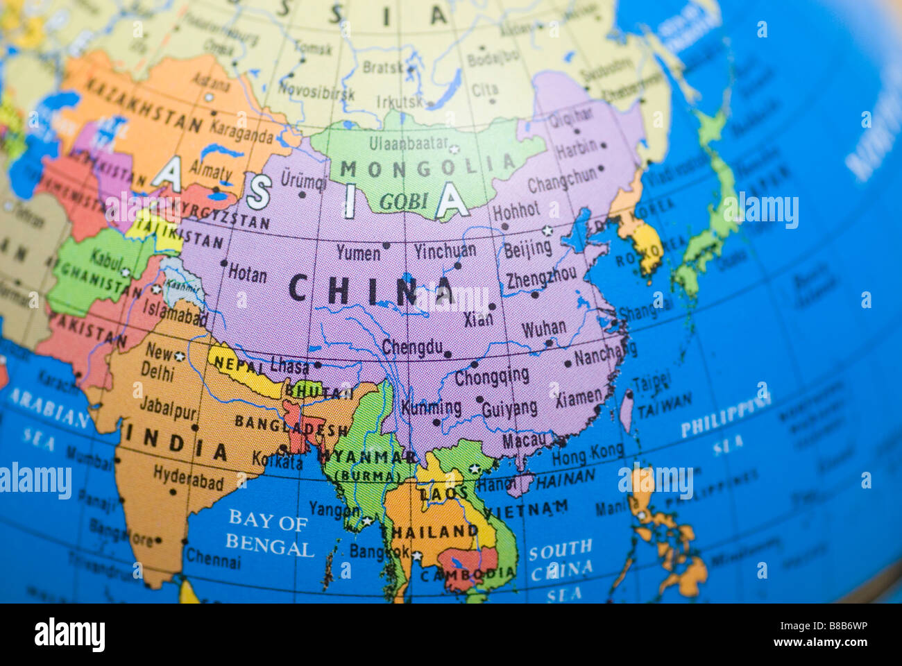 Map of China on a world globe Stock Photo