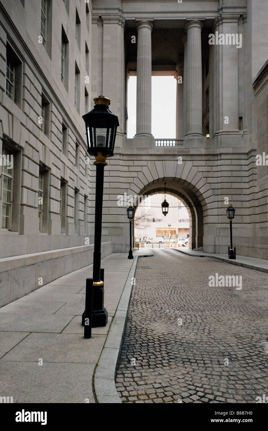This historic alley leads to the the Ronald Regan Building and International Trade Center court yard in Washington DC. Stock Photo
