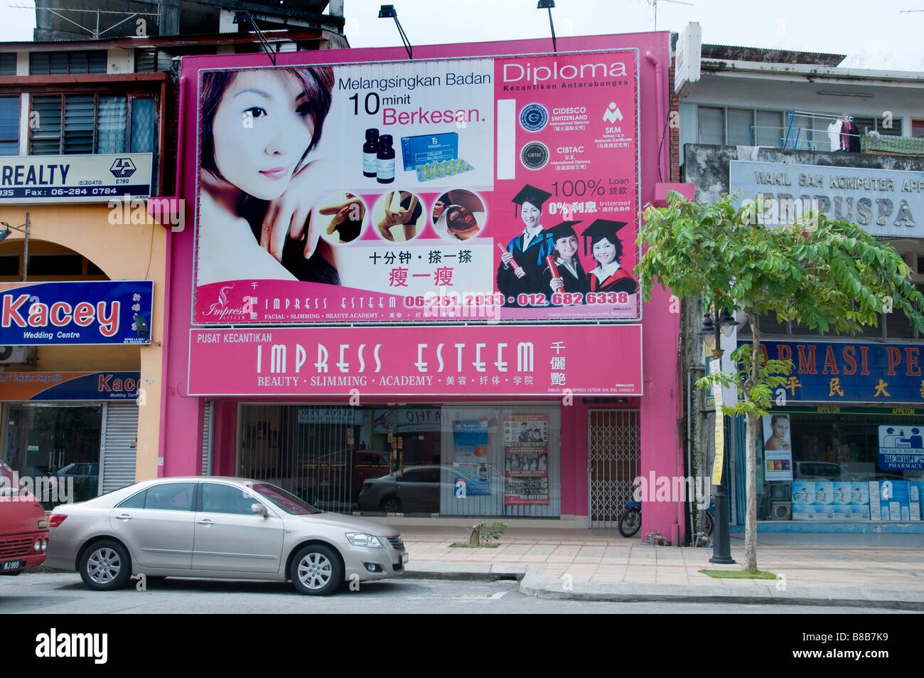 School student diploma Beauty Academy Malacca Malaysia street shop store retail Stock Photo Alamy
