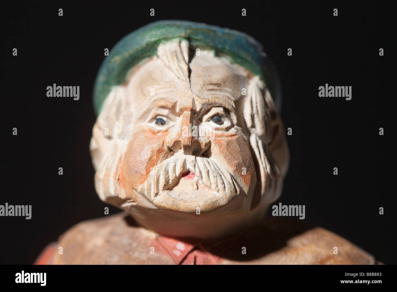 Hand carved wooden figure of a Russian peasant Stock Photo