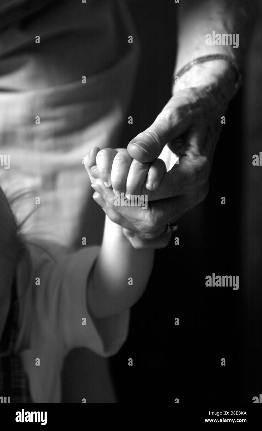 FV4104, Brian Summers; Adult Hand holding Child Hand, B/w Stock Photo ...